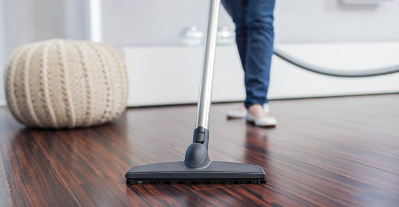 home cleaning Vacuum wooden floor Top 4 Reasons You Might Need a Professional Home Cleaning Service - Cleaning tips 1