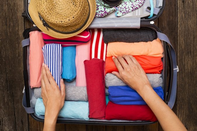10 Easy Tips to Always Finding Cheap Flights 20 packing a luggage 10 Easy Tips to Always Finding Cheap Flights - 20