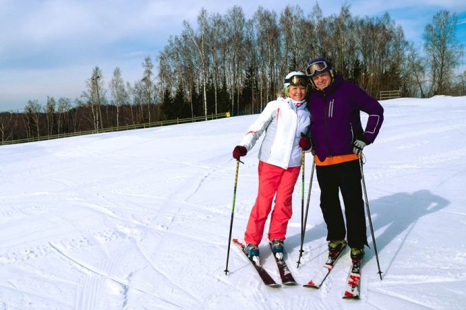 Top 10 Fairytale Christmas Places for Couples 8 couples skiing in Lapland Finland Top 10 Fairytale Christmas Places for Couples - 8