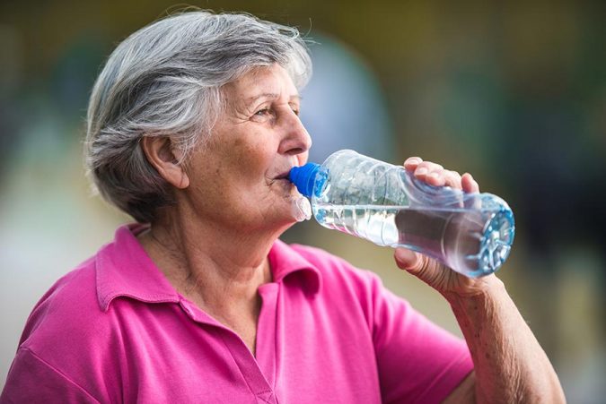 senior drink water The Secret to a Healthy Old Age Lies in Adopting the Right Lifestyle Changes - 7