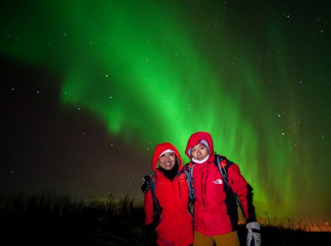 the green aurora illumination Top 10 Fairytale Christmas Places for Couples - 23