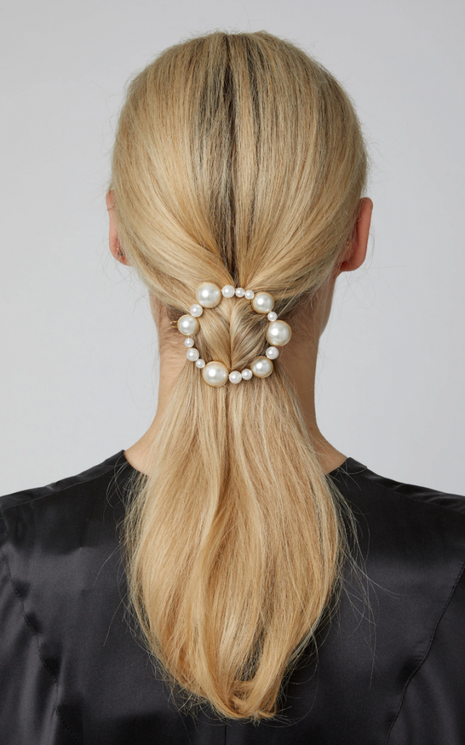 Top 20 Hottest Winter Hairstyles for Women 31 Hair pearly clip low ponytail hairstyle Top 20 Hottest Winter Hairstyles for Women - 31