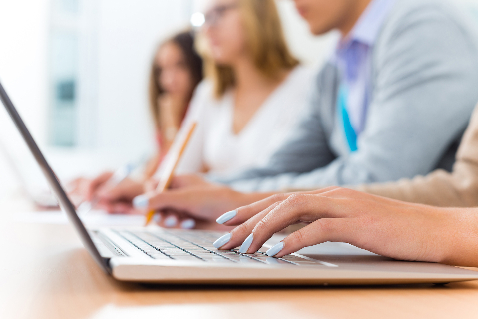 The 10 Highest Rated Advertising Agencies in Dubai 17 using laptop The 10 Highest Rated Advertising Agencies in Dubai - 17