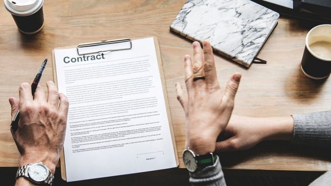 sign a contract How to Secure an Instagram Brand Partnership in Six Steps - 7