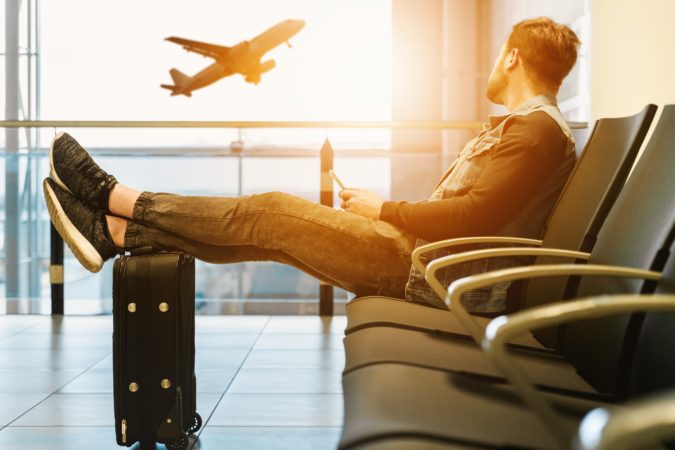 traveler airplane 10 Tips to Get Best Flight Booking Deals - 7