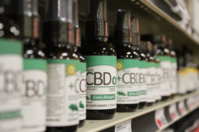 CBD oil displayed in store Can I Buy CBD in Retail Stores? - 1