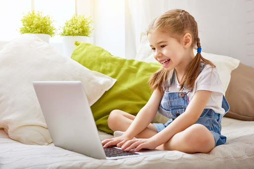 kid using laptop Top 50 Free Learning Websites for Kids - Educational websites 1