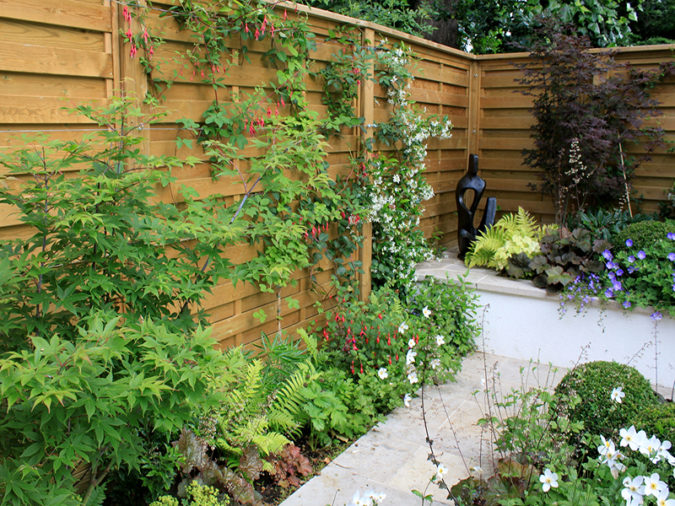 home garden green fencing Top 20 Garden Trends: Early Predictions to Adopt - 33