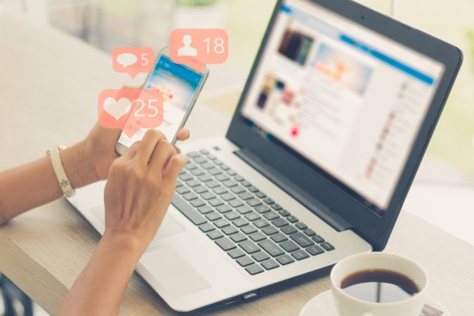 Best Side Jobs for Immigrants and International Students 5 laptop mobile Social Media Specialist Best Side Jobs for Immigrants and International Students - 5