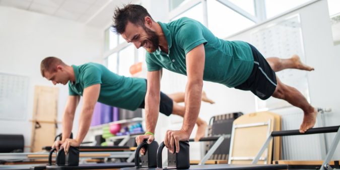 10 Ways to Gain More Clients for Pilates Instructors 13 practicing Pilates 10 Ways to Gain More Clients for Pilates Instructors - 13