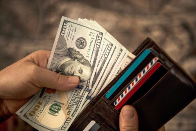 paying money Choosing Best Stove for Your Home - 8