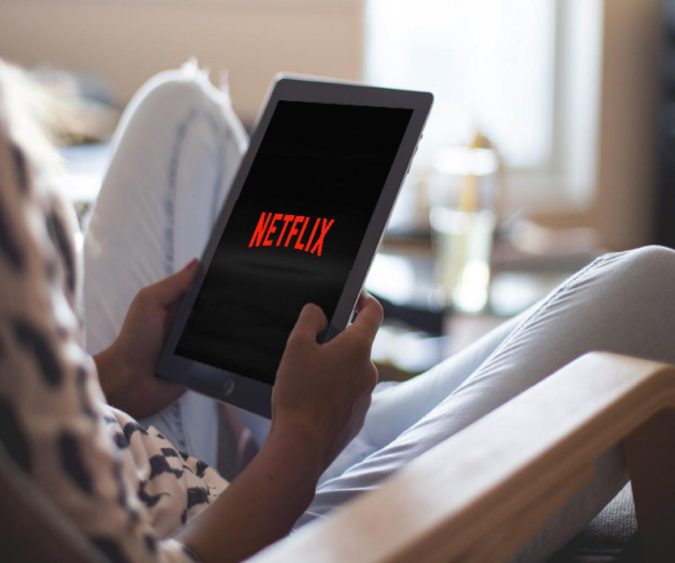 tablet watching netflix Why Netflix Gift Card Is The Perfect Gift - 11