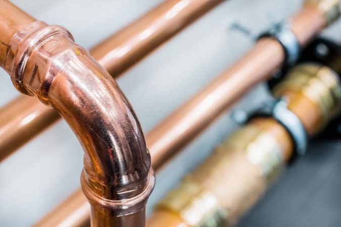 How Hard Is It to Add a New Bathroom to an Older Home? 4 Metallic pipes plumbing 2 How Hard Is It to Add a New Bathroom to an Older Home? - 4