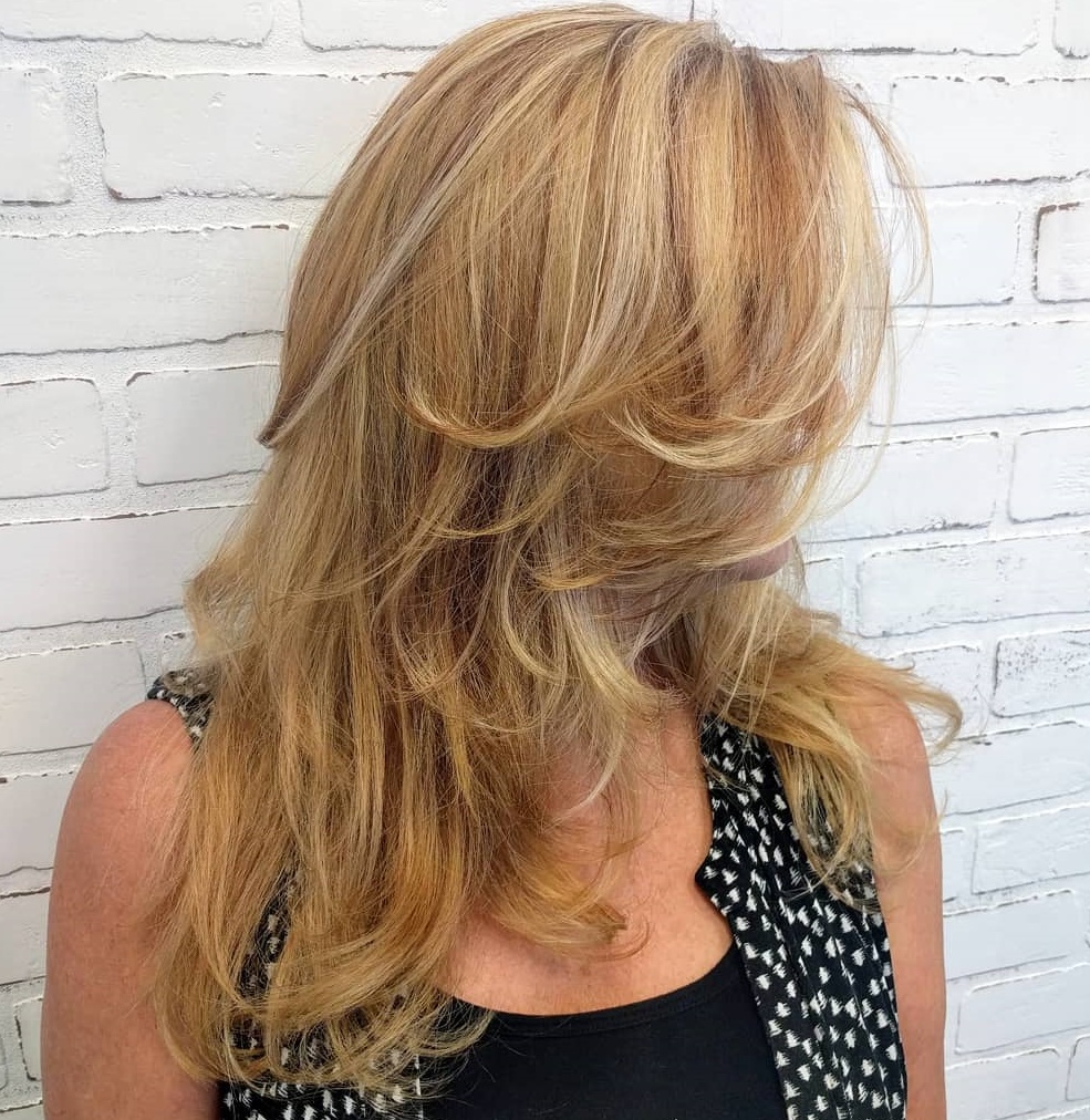 Long hair with beachy waves and layers. 32 Amazing Hairstyles for Women Over 60 to Look Younger - 9
