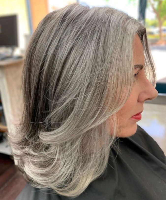 The Gray and layered hair. 15 Beautiful Gray Hairstyles that Suit All Women Over 50 - 11