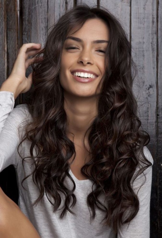 The dark curls. 25 Best Trendy Hairstyles for Women over 40 to Look Younger - 15