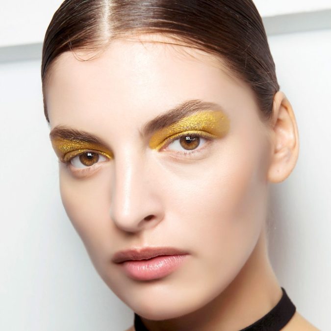 The opaque yellow Best 10 Colorful Face Makeup Looks to Try - 23