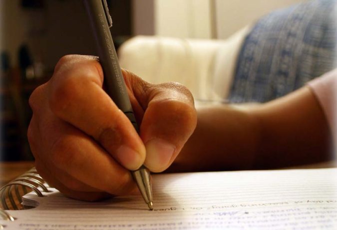 33 Good Compare and Contrast Essay Topics for College 2 kid writing essay 33 Good Compare and Contrast Essay Topics for College - 2