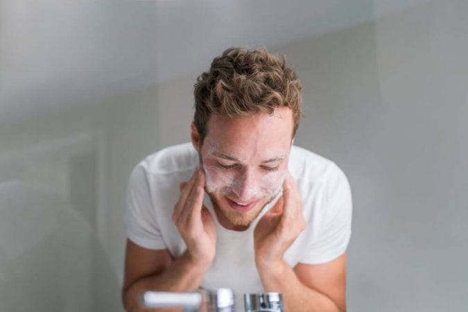 How to Look Your Best While Wearing a Mask – Tips for Men and Women 9 man exfoliating face How to Look Your Best While Wearing a Mask – Tips for Men and Women - 9
