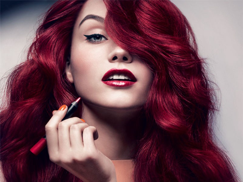 Red-hair-and-red-lipstick Top 10 Outdated Beauty and Makeup Trends to Avoid in 2022