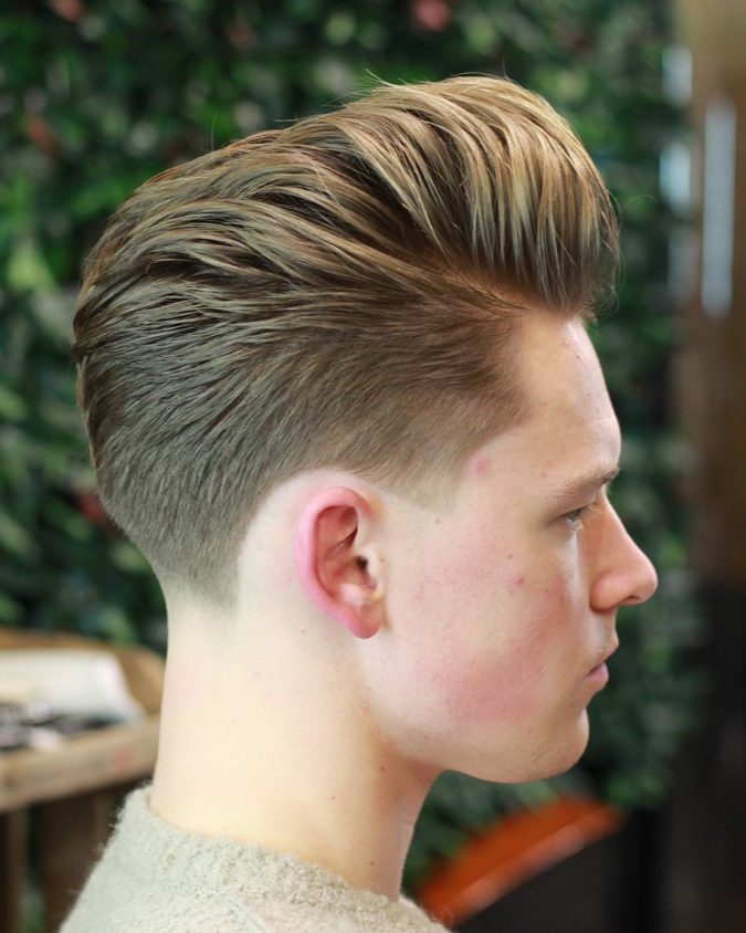 The classic pompadour. 2 Top 10 Hottest Hairstyles To Suit Men With Round Faces - 10