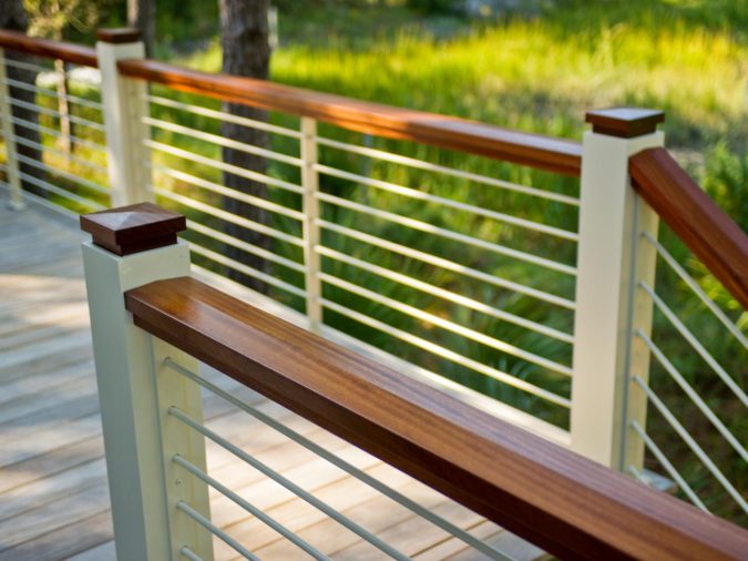 house-deck-wooden-railing-675x506 4 Simple Steps to Increase the Value of the House with Deck Railing Project Ideas