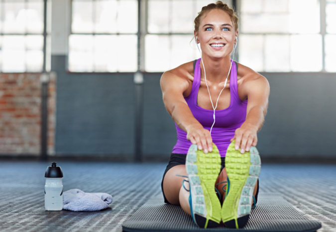 7 Benefits of GetFit Fitness Mobile App for Your Health 12 woman exercising fitness 5 7 Benefits of GetFit Fitness Mobile App for Your Health - 12