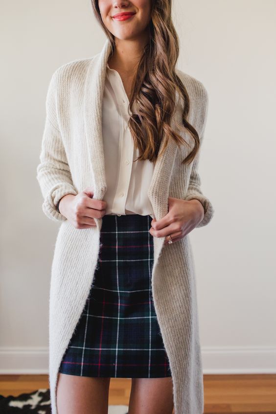 cardigan and pencil skirt What Women Should Wear for a Business Meeting [60+ Outfit Ideas] - 32