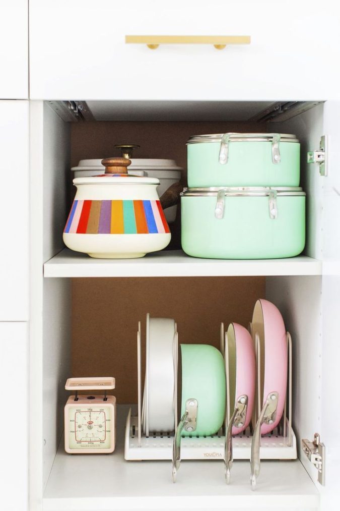 Storing-pans-sideways-675x1013 100+ Smartest Storage Ideas for Small Kitchens in 2022