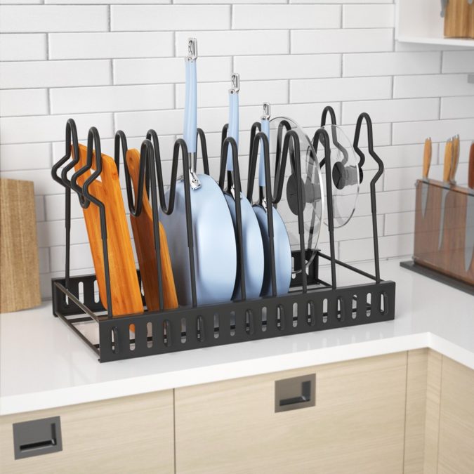 Using expandable cookware organizer. 100+ Smartest Storage Ideas for Small Kitchens - 31