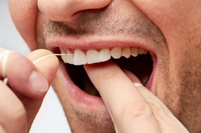 floss teeth Your Complete Guide for Fixing Dental Issues - 2