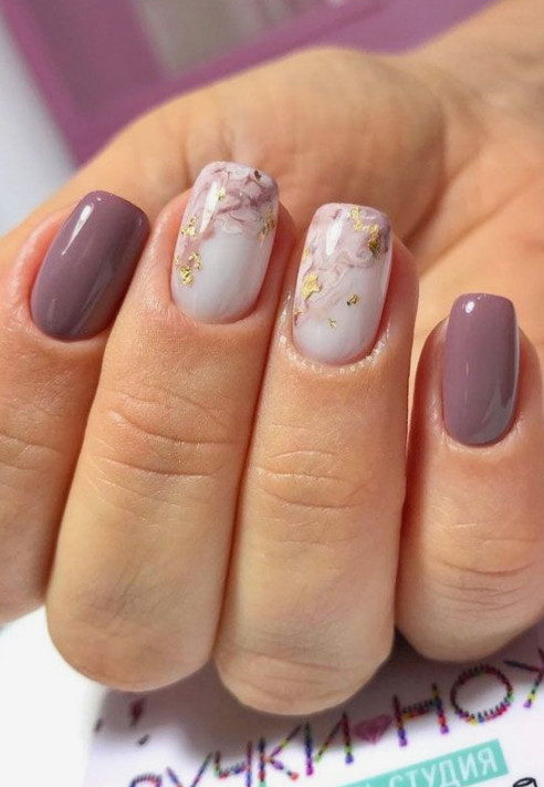 white and purple gel marble nail design