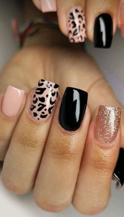 black and pink leopard print nail art