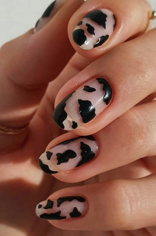 negative space cow print nail art