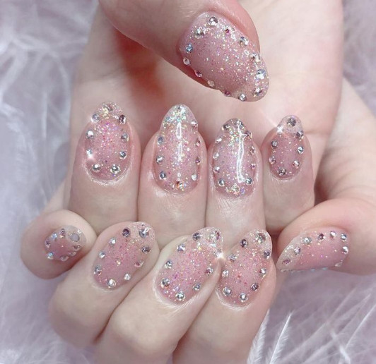 37+ Gorgeous nail-art designs to sparkle this winter 36 negative space gem winter nail ideas