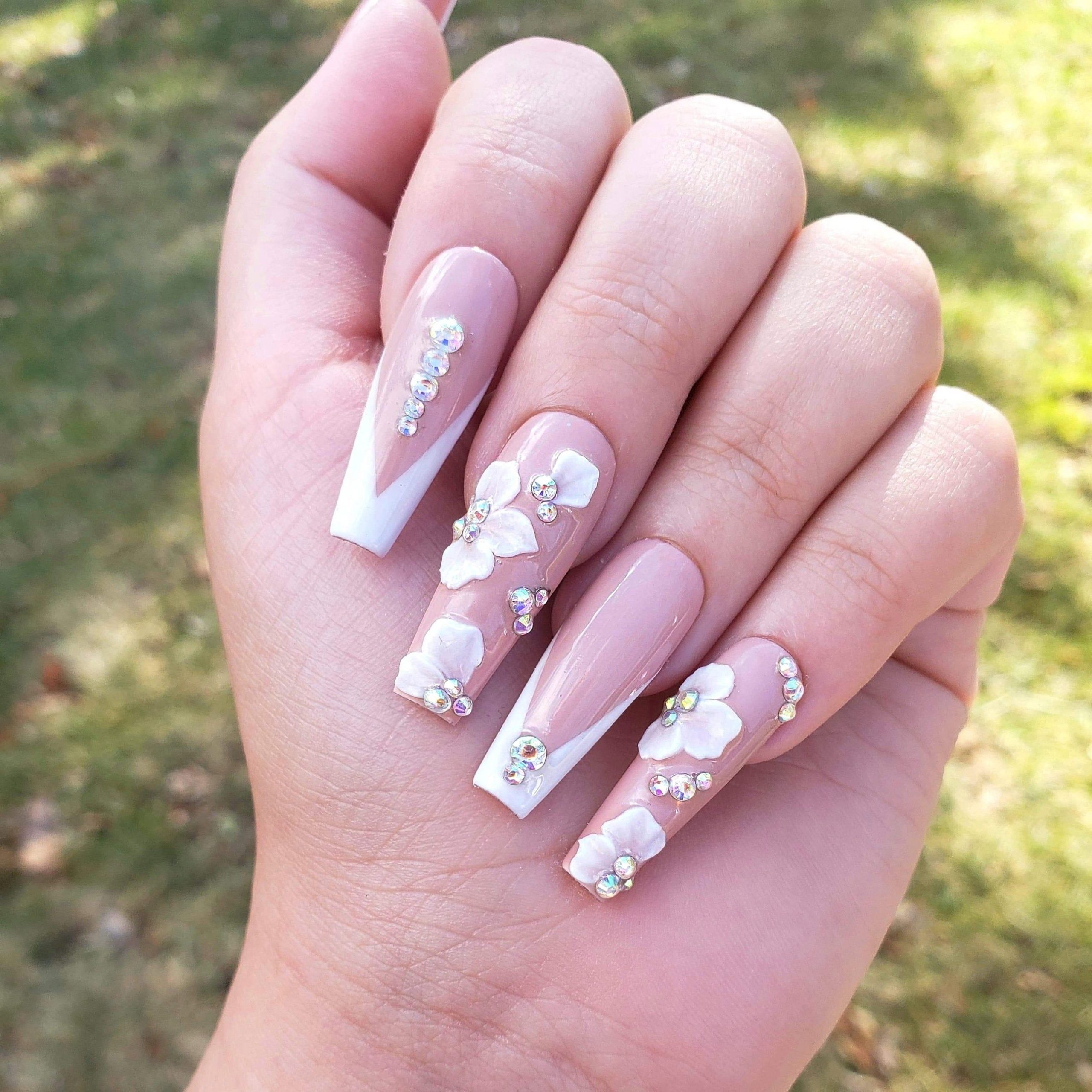 white floral nails
