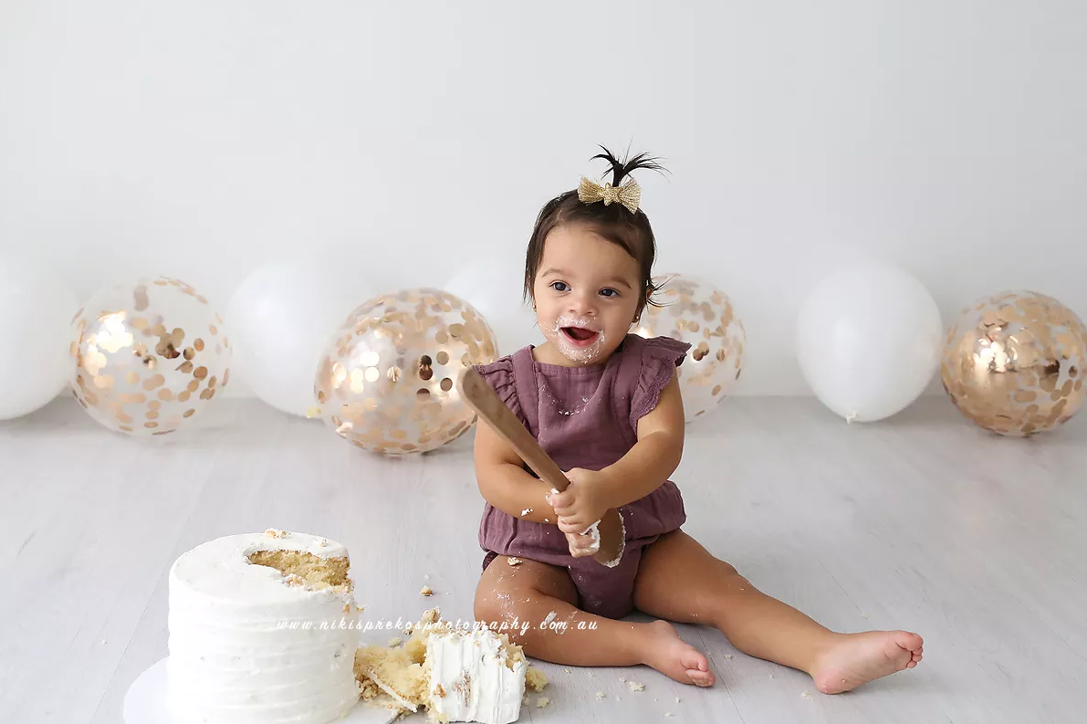 Niki Sprekos Photography logo Top 10 Best Cake Smash Photographers in the World - 32