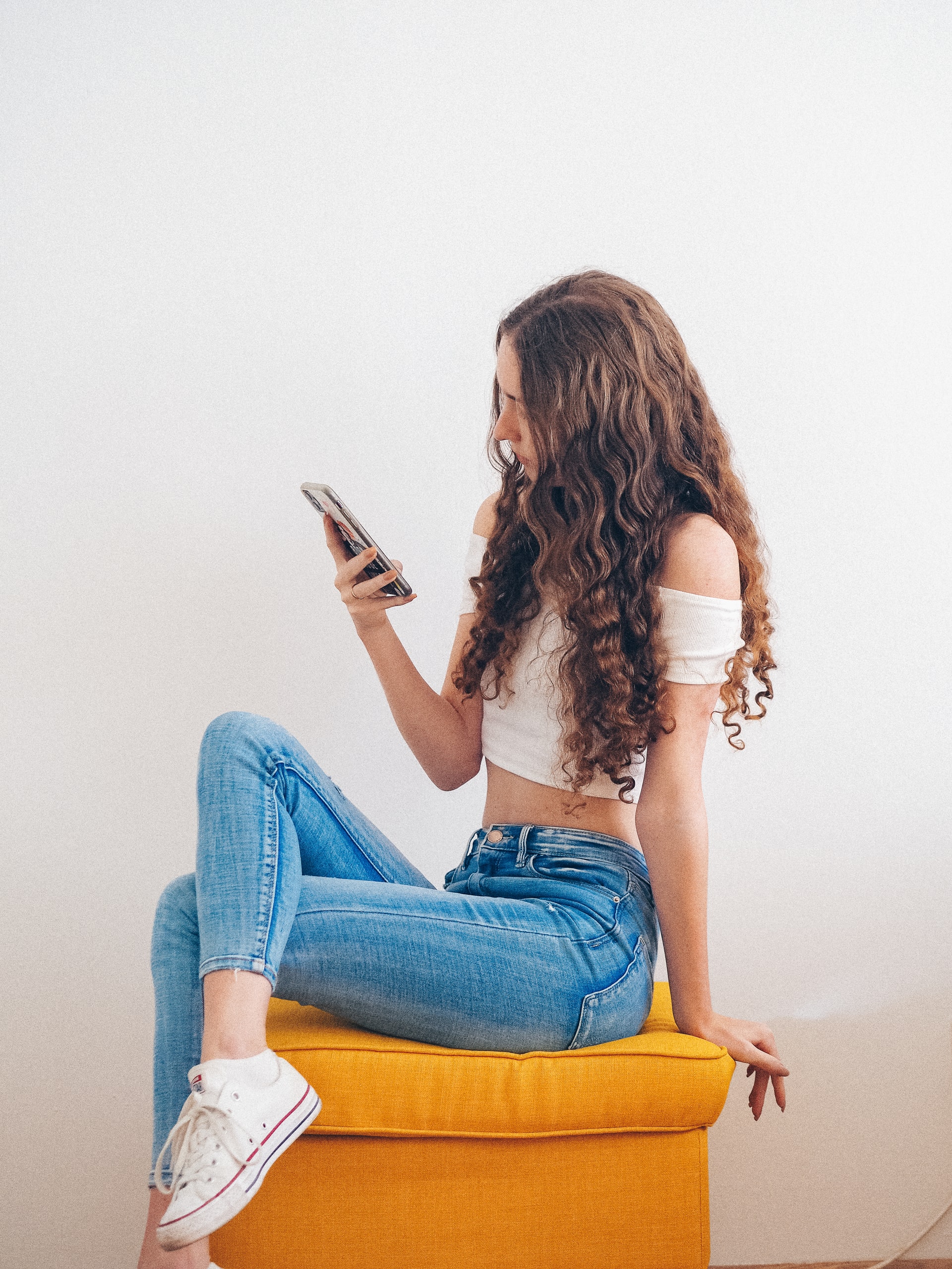 10 TikTok Trends and Tips to Try Out This Year to Build a High-Performing TikTok Channel with High Following 9 girl with phone 10 TikTok Trends and Tips to Try Out This Year to Build a High-Performing TikTok Channel with High Following - 3