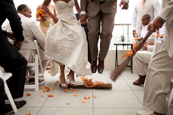 7 Unique Wedding Traditions from Around the World You Never Knew 8 Jumping the Broom 7 Unique Wedding Traditions from Around the World You Never Knew - 8