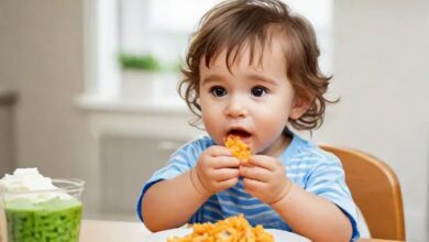 Toddler eating "Top Nutrition Tips for Toddlers: Essential Foods for Growth" - Health & Nutrition 1