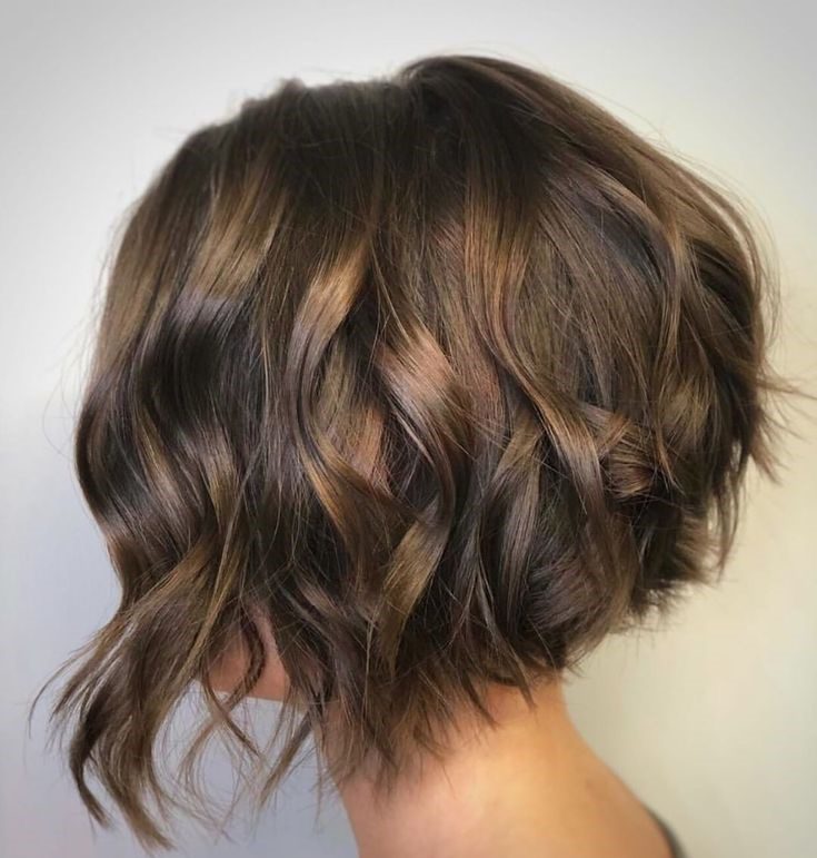 2025's Best Hairstyles for Women Over 50: Flattering Looks to Try 9 Textured Bobs with Side Parts 1 2025's Best Hairstyles for Women Over 50: Flattering Looks to Try - 9