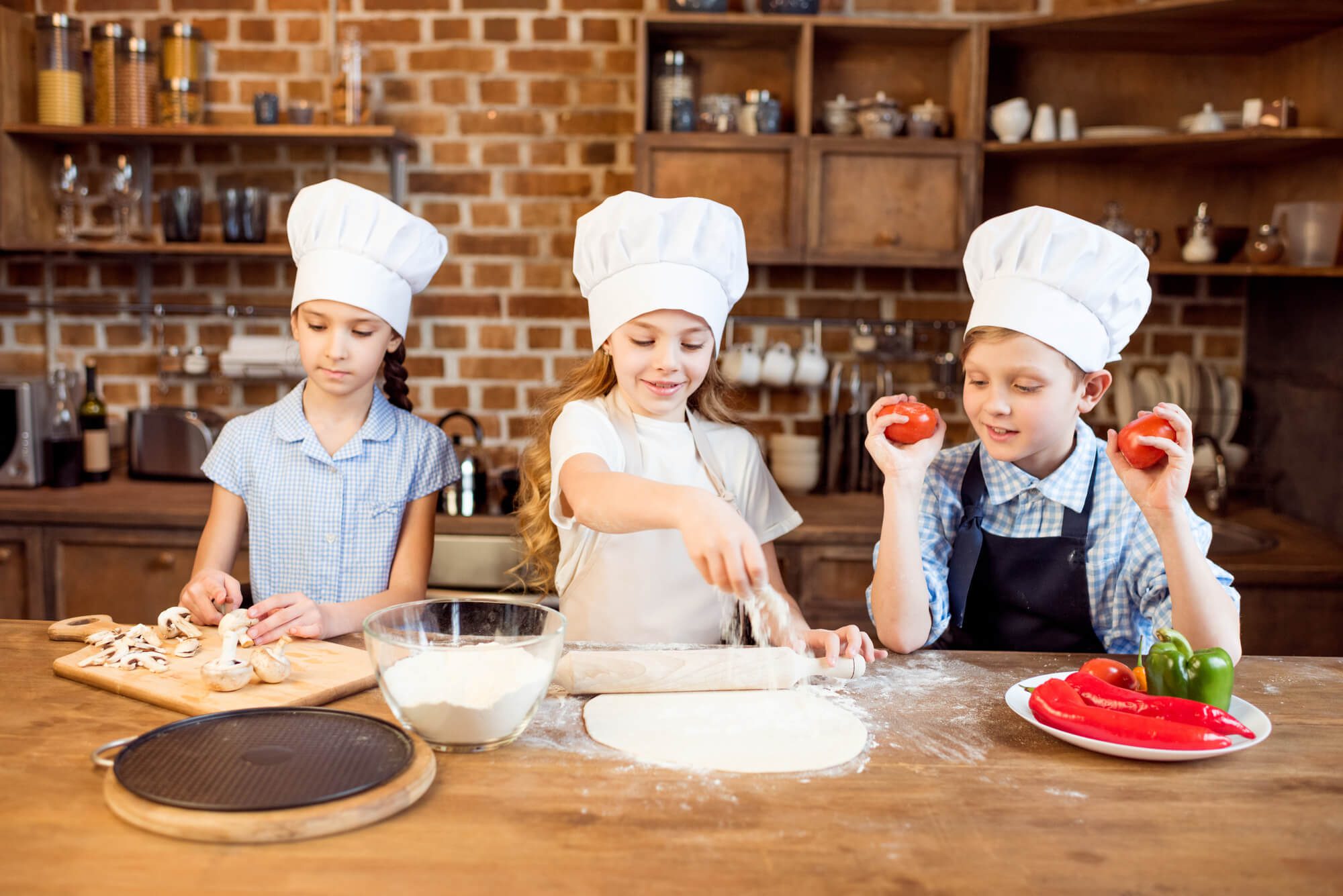 10 Fun Summer Activities for Kids to Keep Them Entertained 7 Cooking or Baking Together 10 Fun Summer Activities for Kids to Keep Them Entertained - 7