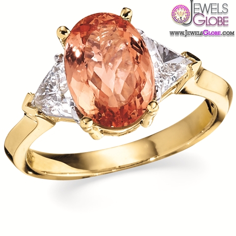 Red colored gemstone engagement rings in Yellow Gold