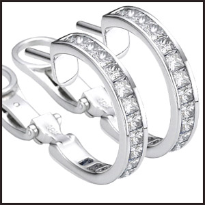 Two diamond hoops earrings set with diamond Princess cut