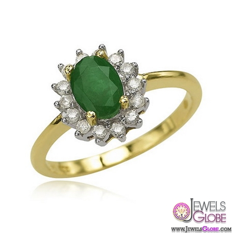 emerald engagement ring in 18k yellow gold